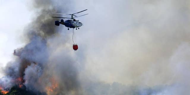 Incêndios florestais estão queimando enquanto partes da Espanha estão enfrentando uma onda de calor recorde. 
